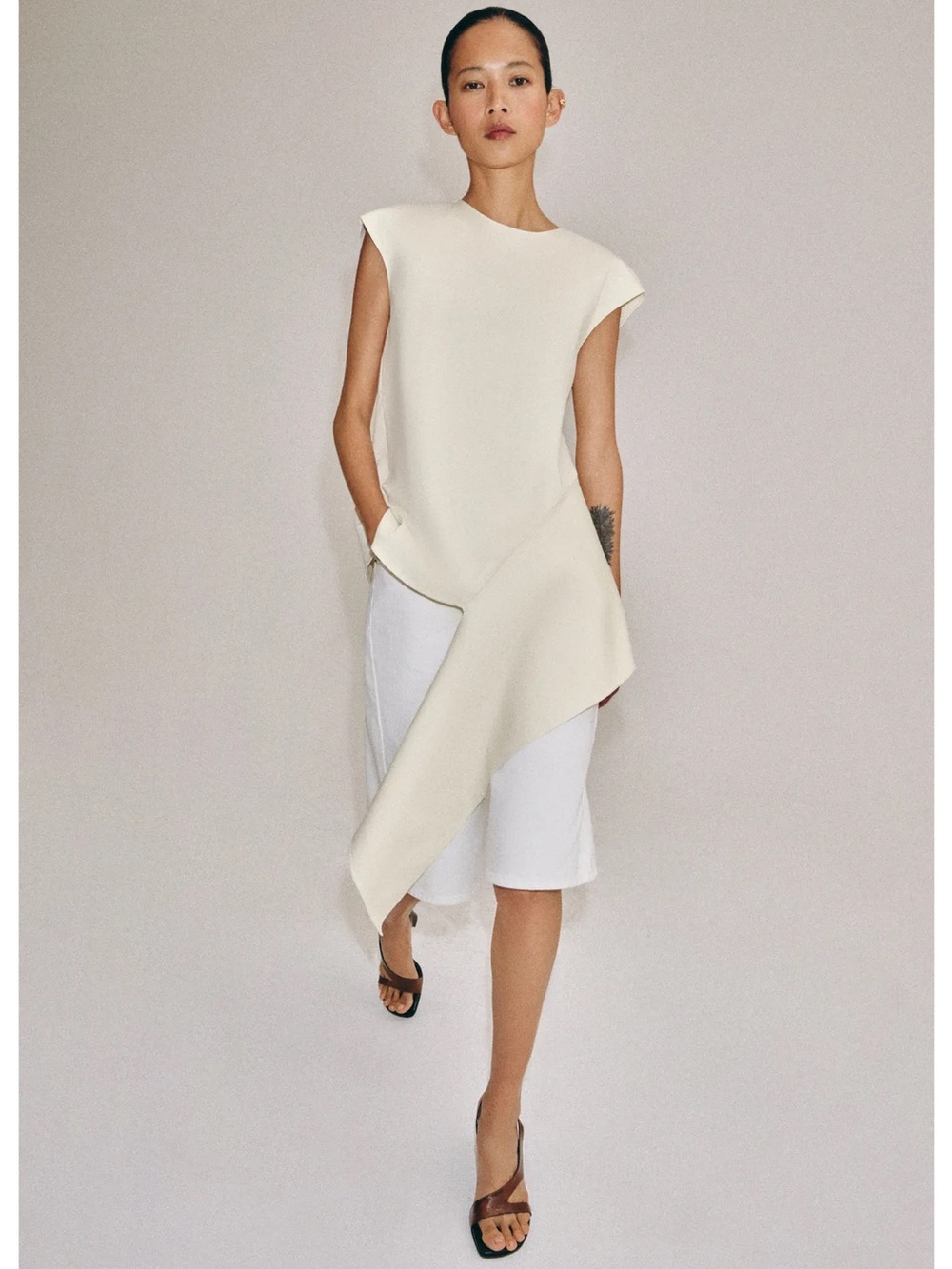 Zara Asymmetrical Cream Draped Sleeveless Top